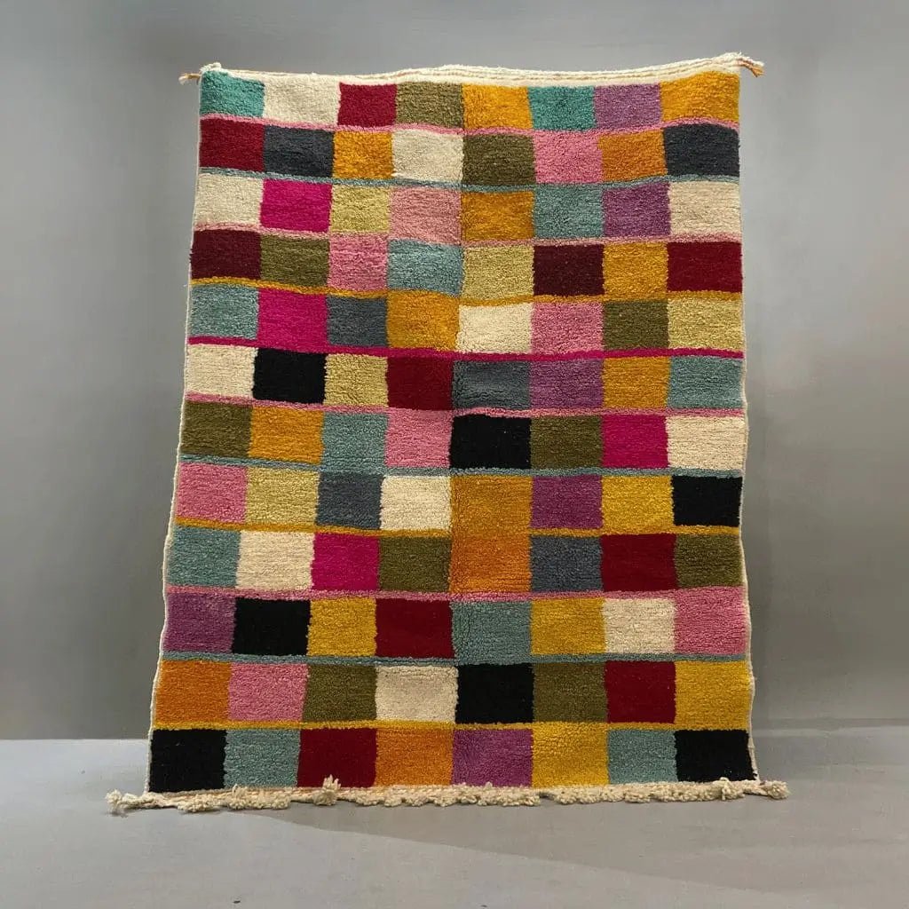 Tapis Beni Ouarain berbère coloré 200×150 cm en laine naturelle, motifs traditionnels, fabrication artisanale.
