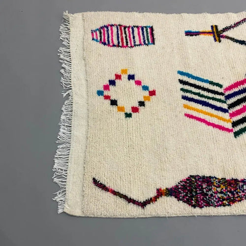 Tapis berbère coloré Azilal 165×100 cm, géométrie authentique et palette de couleurs vives.