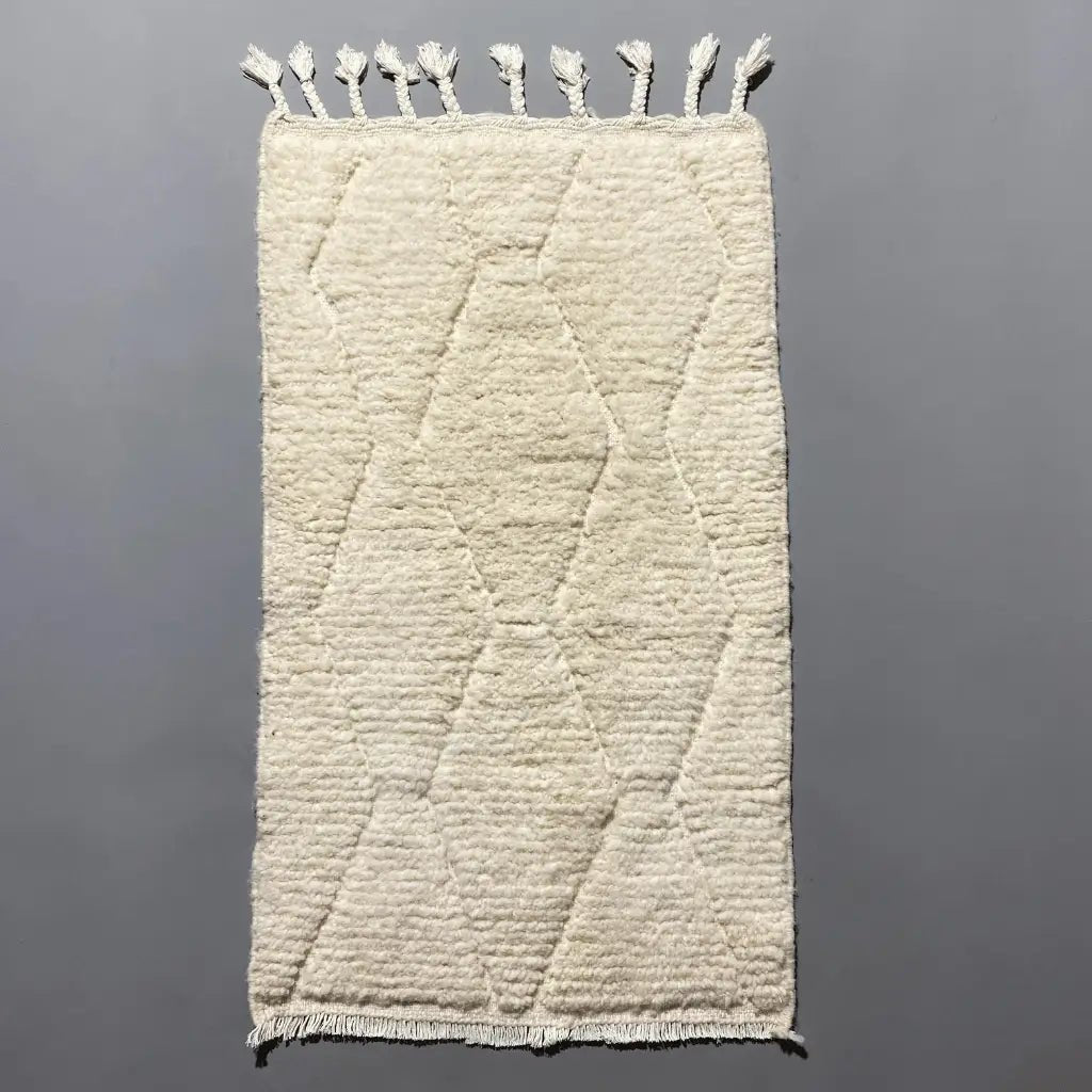 Petit tapis ivoire 98×60 cm en laine, tissé main — idéal entrée, chambre ou bureau