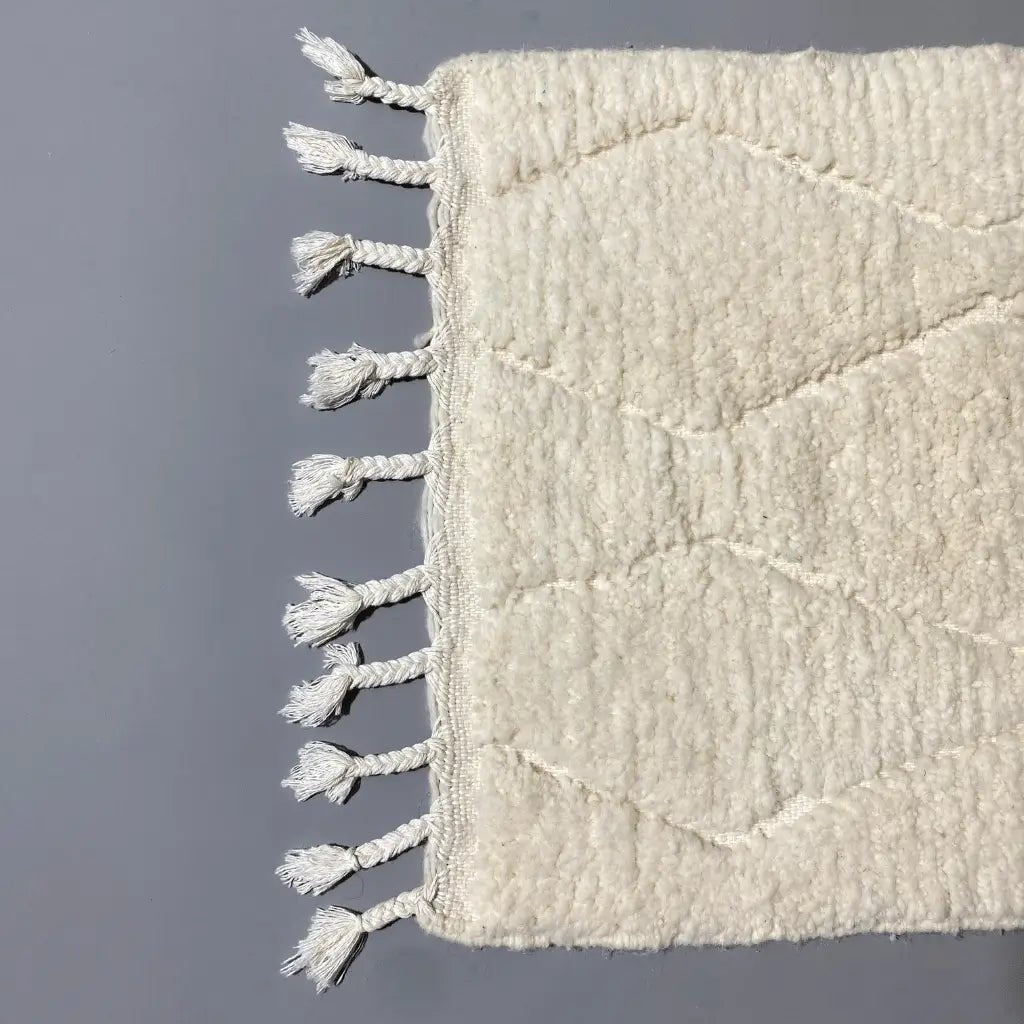 Petit format ivoire 98×60 cm, tissage artisanal en laine 100 %